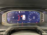 the dashboard of a car with a digital display on it