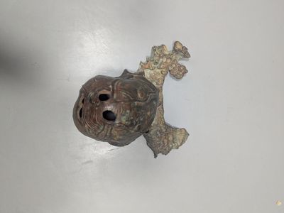 a small metal object that is on a table