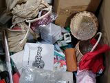 a cardboard box filled with assorted items in it
