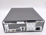 the back of a computer with a hard drive attached to it
