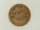 an image of a gold coin on a white surface