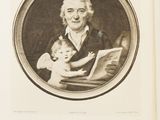 an old picture of a man holding a baby in his arms
