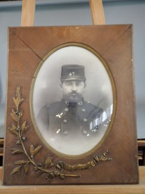 a picture of a man in a military uniform in a picture frame