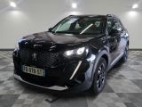 vue de face d'un SUV noir garé dans un garage