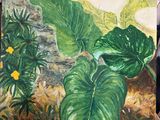 un tableau représentant une plante posée sur un chevalet dans une pièce