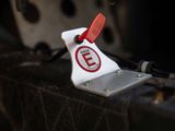 a close up of a luggage tag attached to a piece of luggage