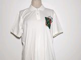 white polo shirt with a green and red design on the chest