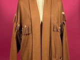 a brown jacket with fringes on a mannequin mannequin mannequin mannequin mannequin mannequin mannequin mannequin