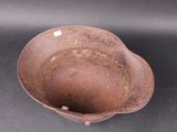 a brown bowl that is sitting on a table