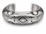an image of a silver bracelet with black and white designs on it