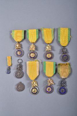many medals and medals displayed on a wall