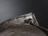 a close up of a metal object on a table