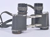 a pair of binoculars that are sitting on a table
