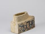 a small vase that is sitting on a table