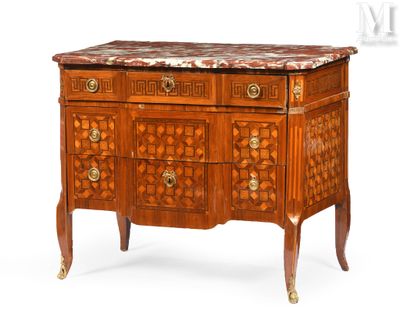 an antique chest of drawers with a marble top