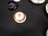 a lot of plates and cups on the table