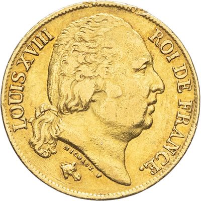gros plan d'une pièce d'or sur fond blanc