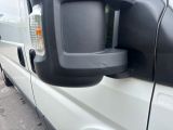 a close up of a side view mirror on a van