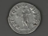 a silver coin with a picture of a man on it