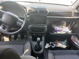 the interior of a car with a steering wheel, dashboard, and dash board