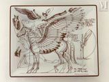 une assiette sur laquelle sont représentés un cheval et un oiseau