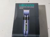 a box with a hair clipper in it on a table