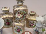 a lot of vases that are sitting on a table