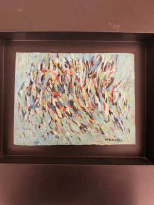 painting of a group of birds in flight in a brown frame