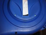 a blue hose sitting on top of a metal stand