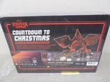 the box is open to show the contents of a christmas ornament