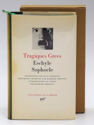 an open book with a picture of a man ' s face on it