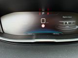 the dashboard of a car with a digital display on it