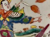 a picture of a decorative vase with a woman on it