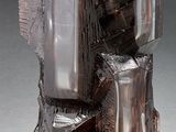 un vase en verre orné d'une structure ressemblant à un rocher