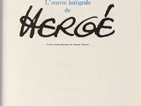 a white book with black writing on the cover of it