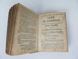 a book open on a table with a bunch of pages