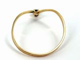 a close up of a gold ring with a knot on it