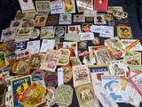 many different types of beer labels on a table