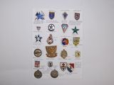 a picture of a poster with many different badges on it