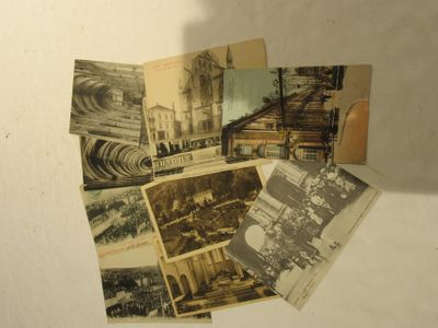 a bunch of old photos that are on a table