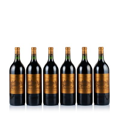 six bottles of red wine lined up in a row