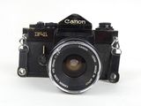 a black camera with a lens attached to it