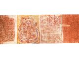 trois œuvres d'art sont exposées sur une surface blanche