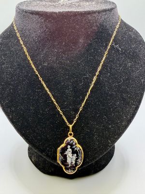 Une chaîne en or jaune 750 millièmes mailles rectangulaires …