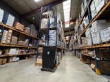 a large warehouse filled with lots of boxes and pallets