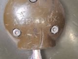 a close up of a metal object with wires attached to it