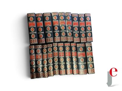 a lot of books stacked on top of each other