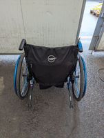 Un fauteuil roulant (photo 3)