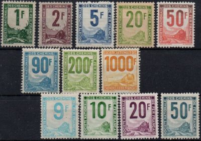 a close up of a bunch of stamps with numbers on them