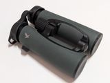 a pair of binoculars sitting on a white surface